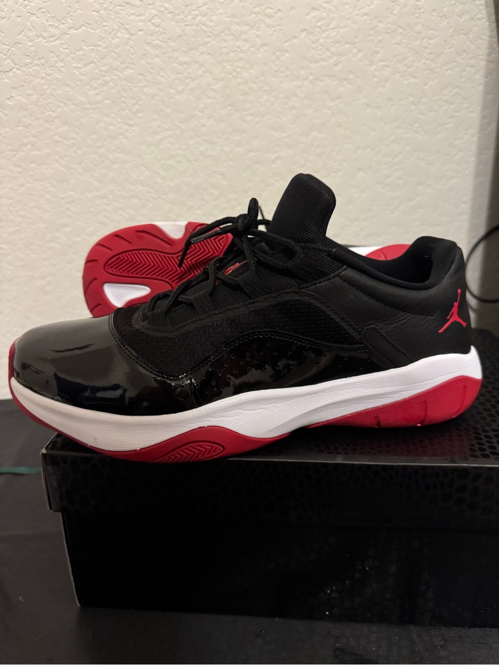 Jordan 11 CMFT Bred Black and Red Low-Top Sneakers